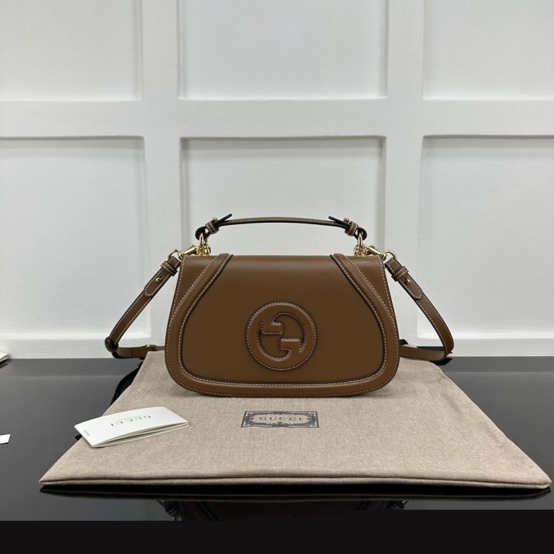 G*u*i top handle bags
